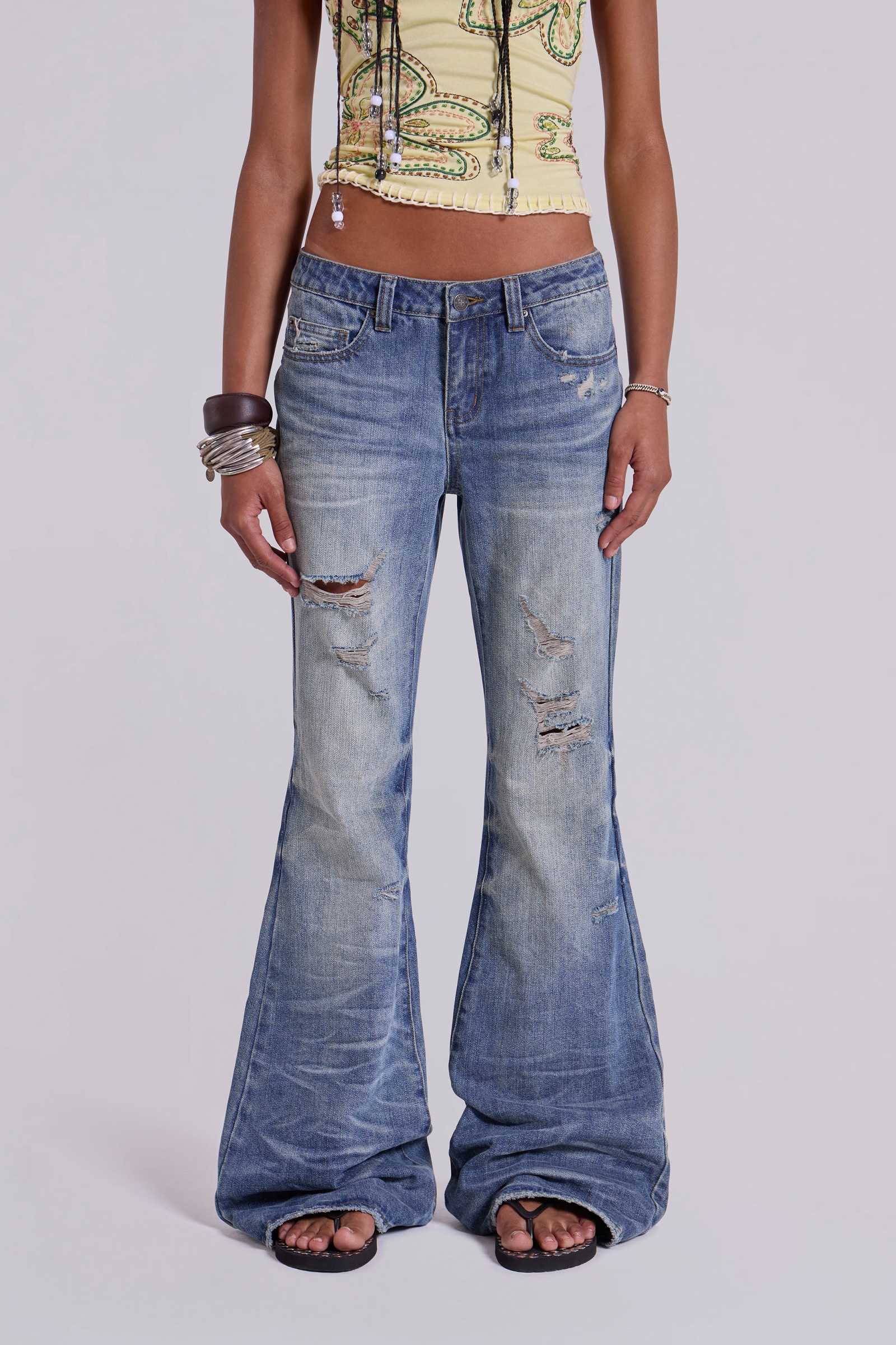 Mid Blue Distressed Creased Drift Flared Jeans