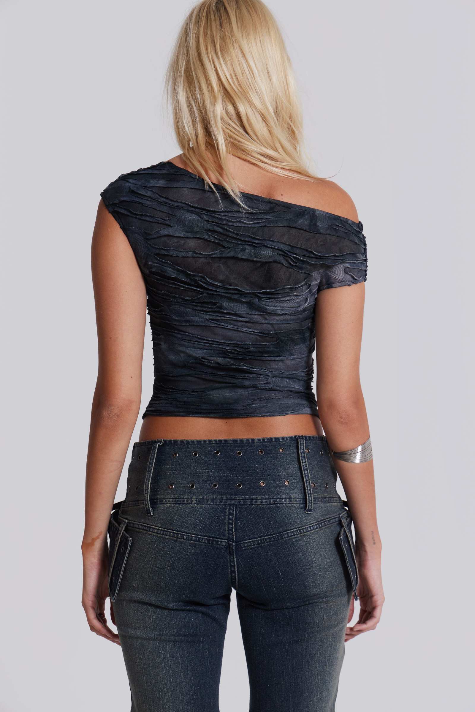 Reign Asymmetric Top