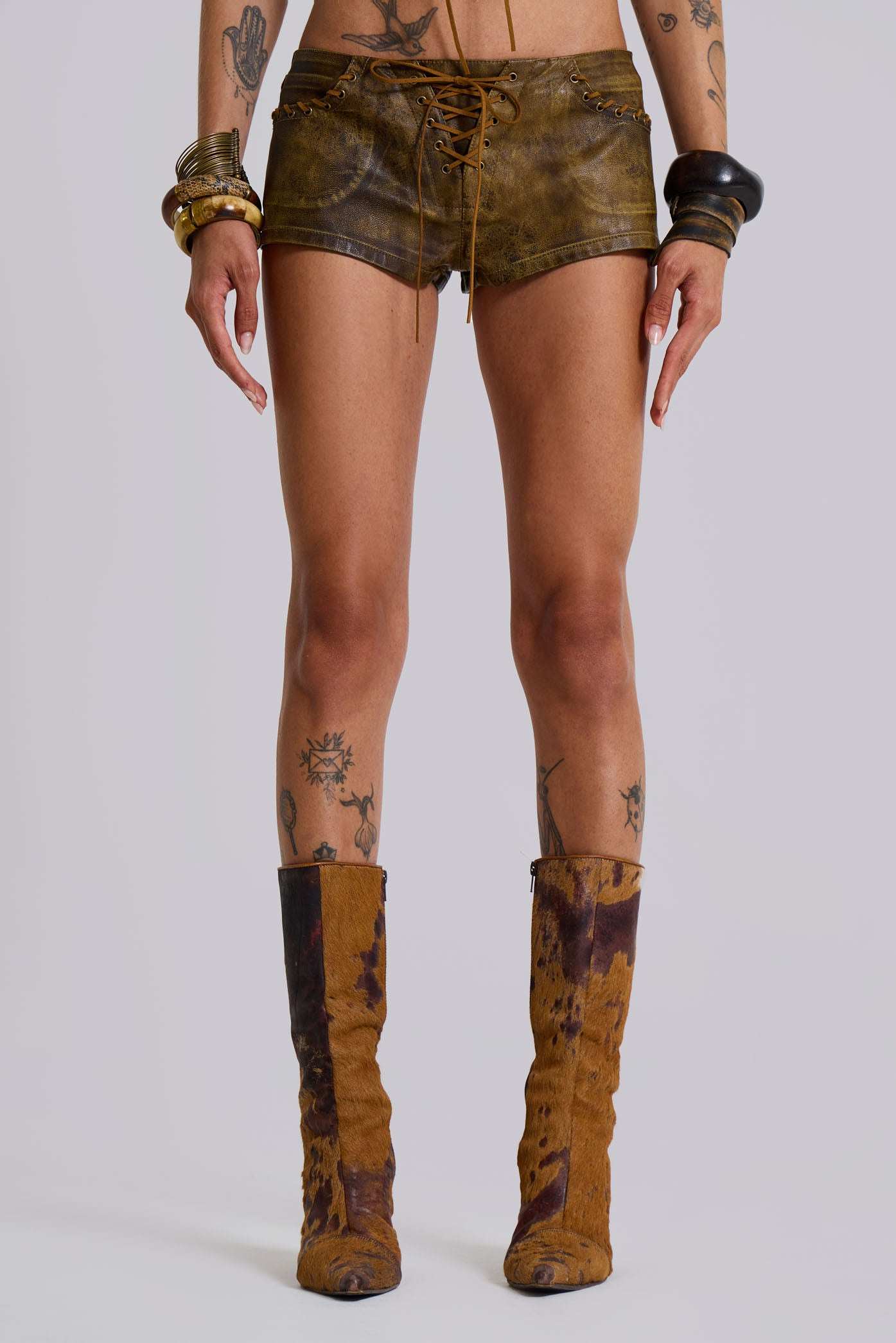 Vaca Whipstitch Faux Leather Mini Shorts in Brown