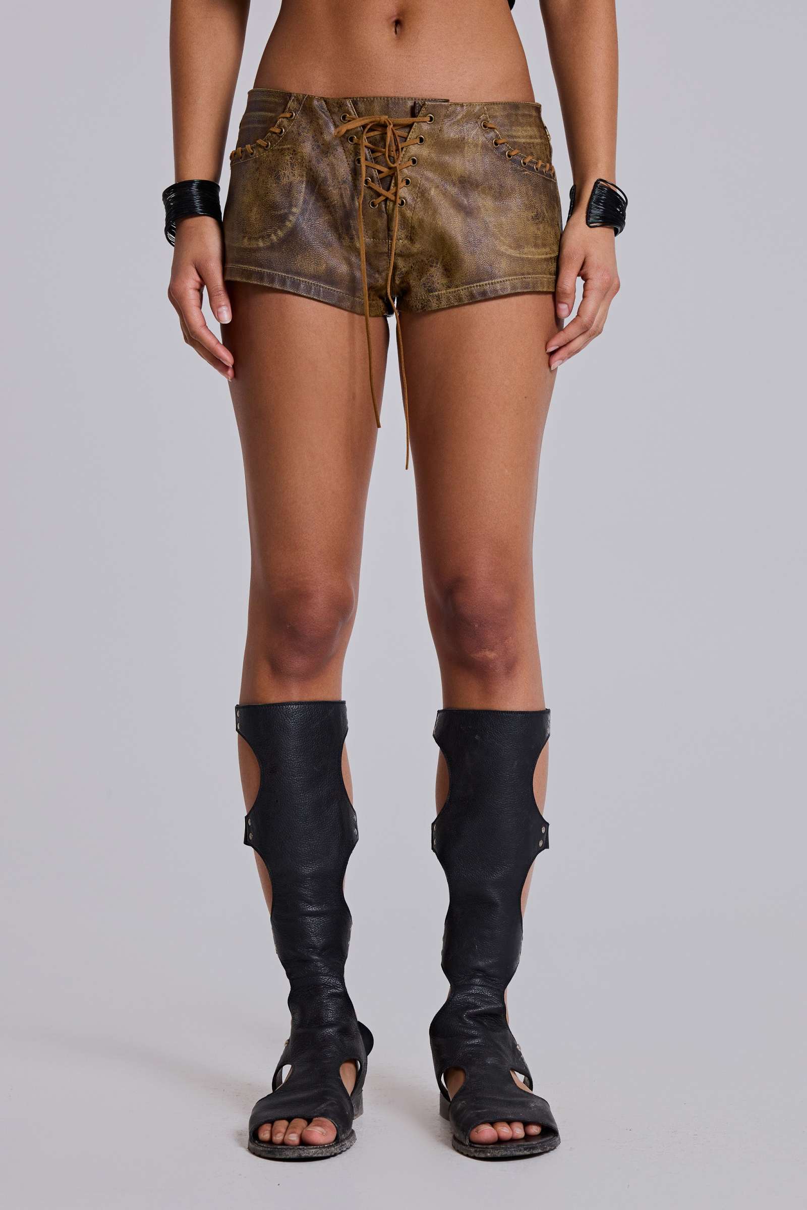 Vaca Whipstitch Faux Leather Mini Shorts in Brown