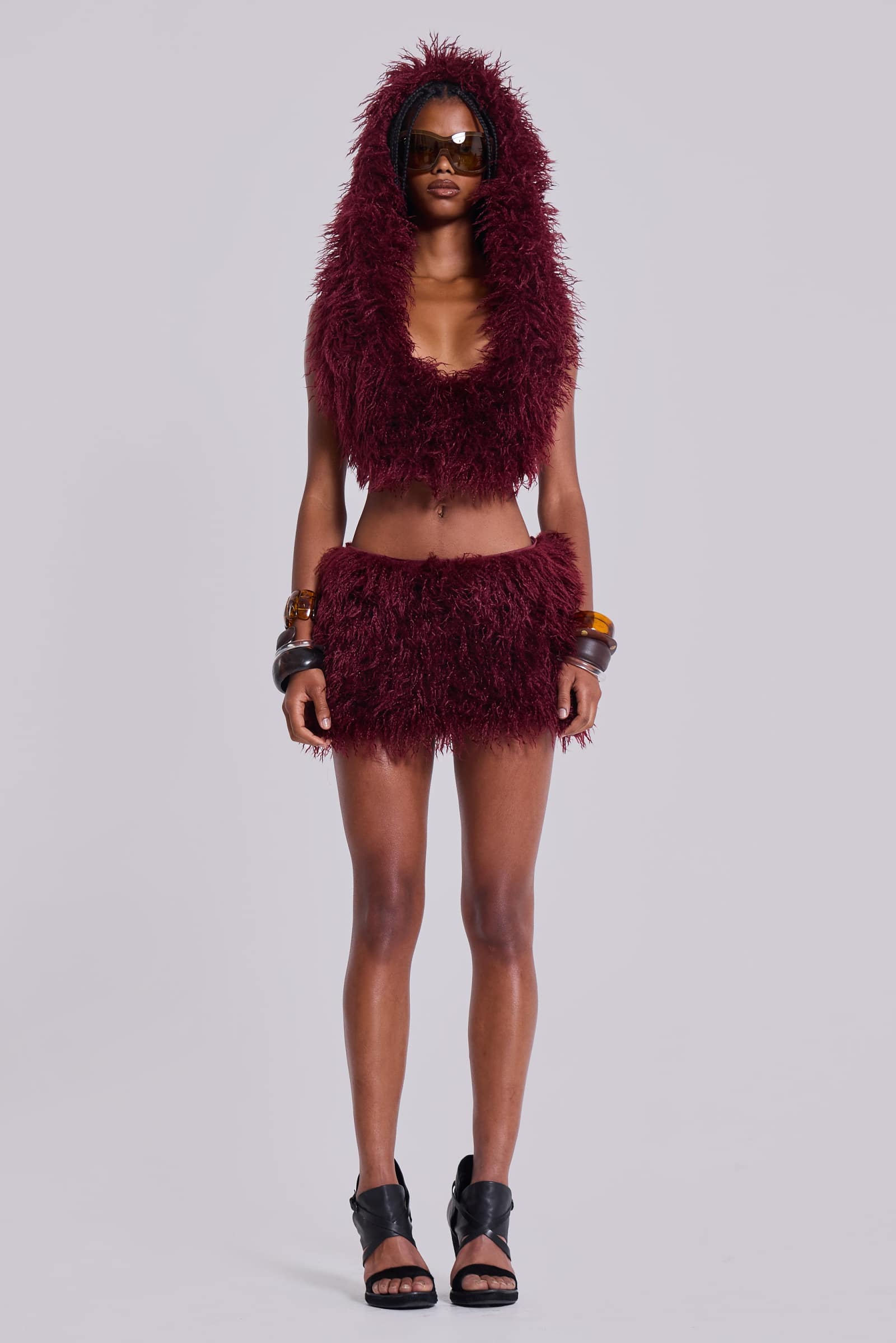 Haka Mongolian Faux Fur Backless Top in Wine