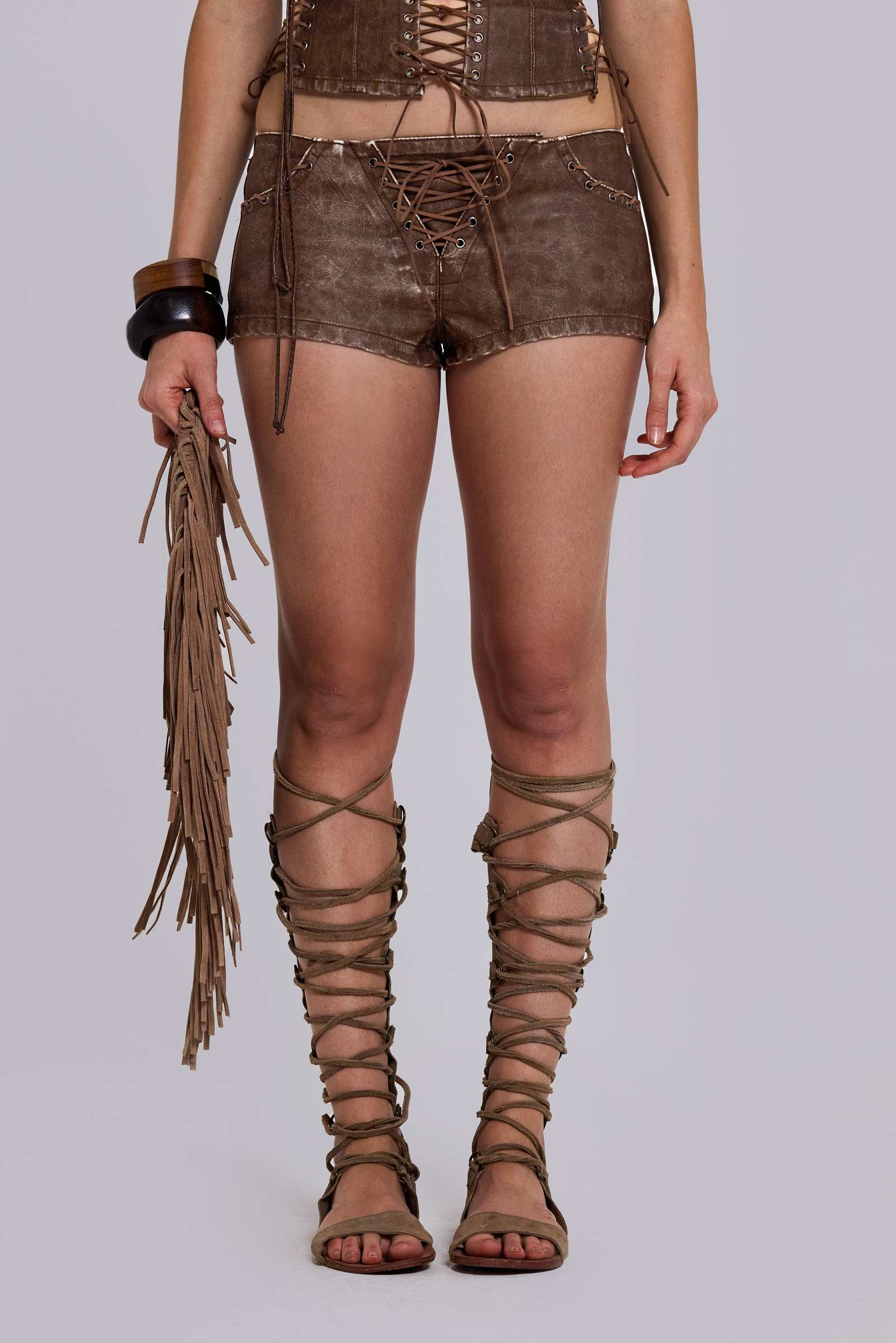 Vaca Whipstitch Faux Leather Mini Shorts in Brown