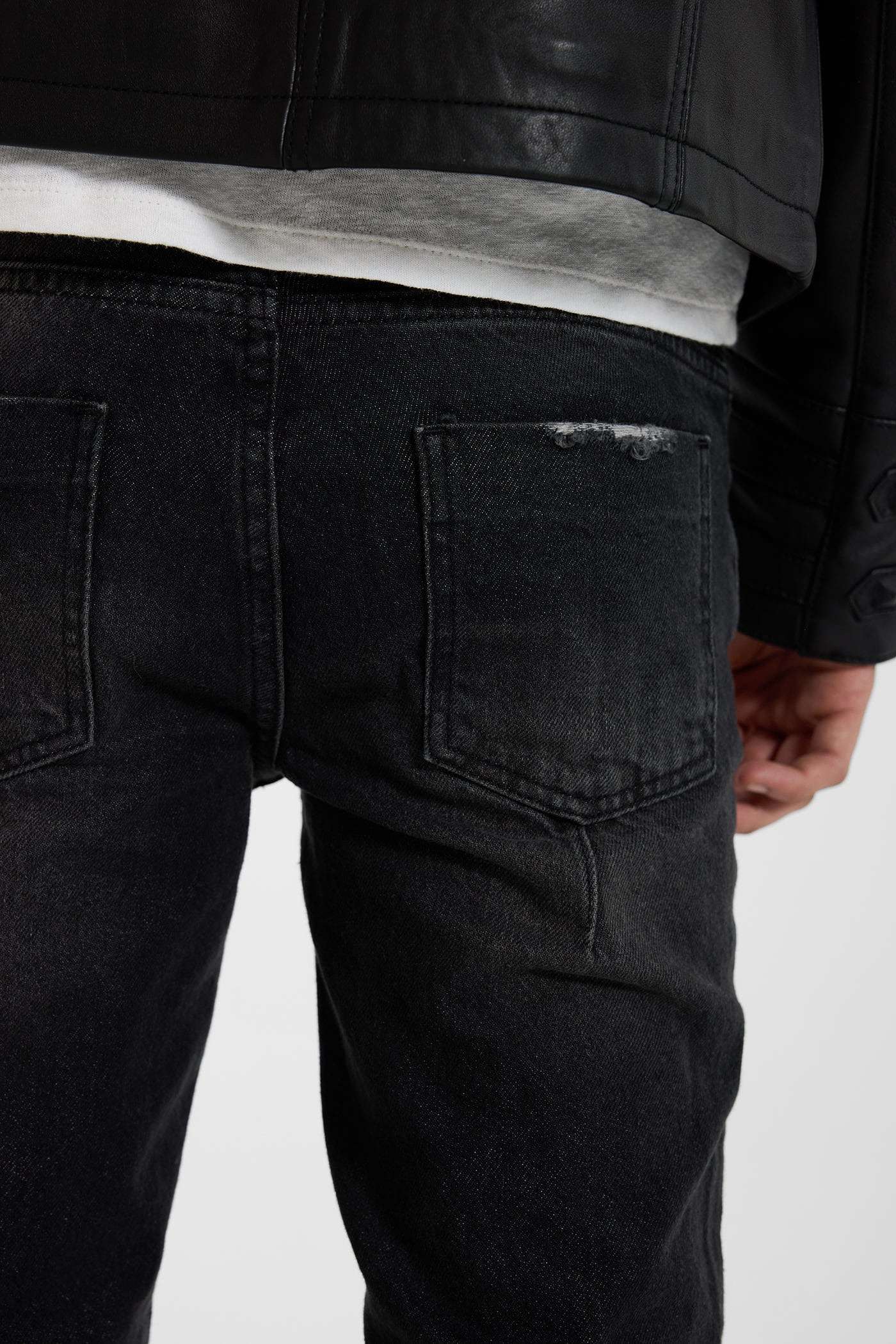 Washed Black Drain Jeans