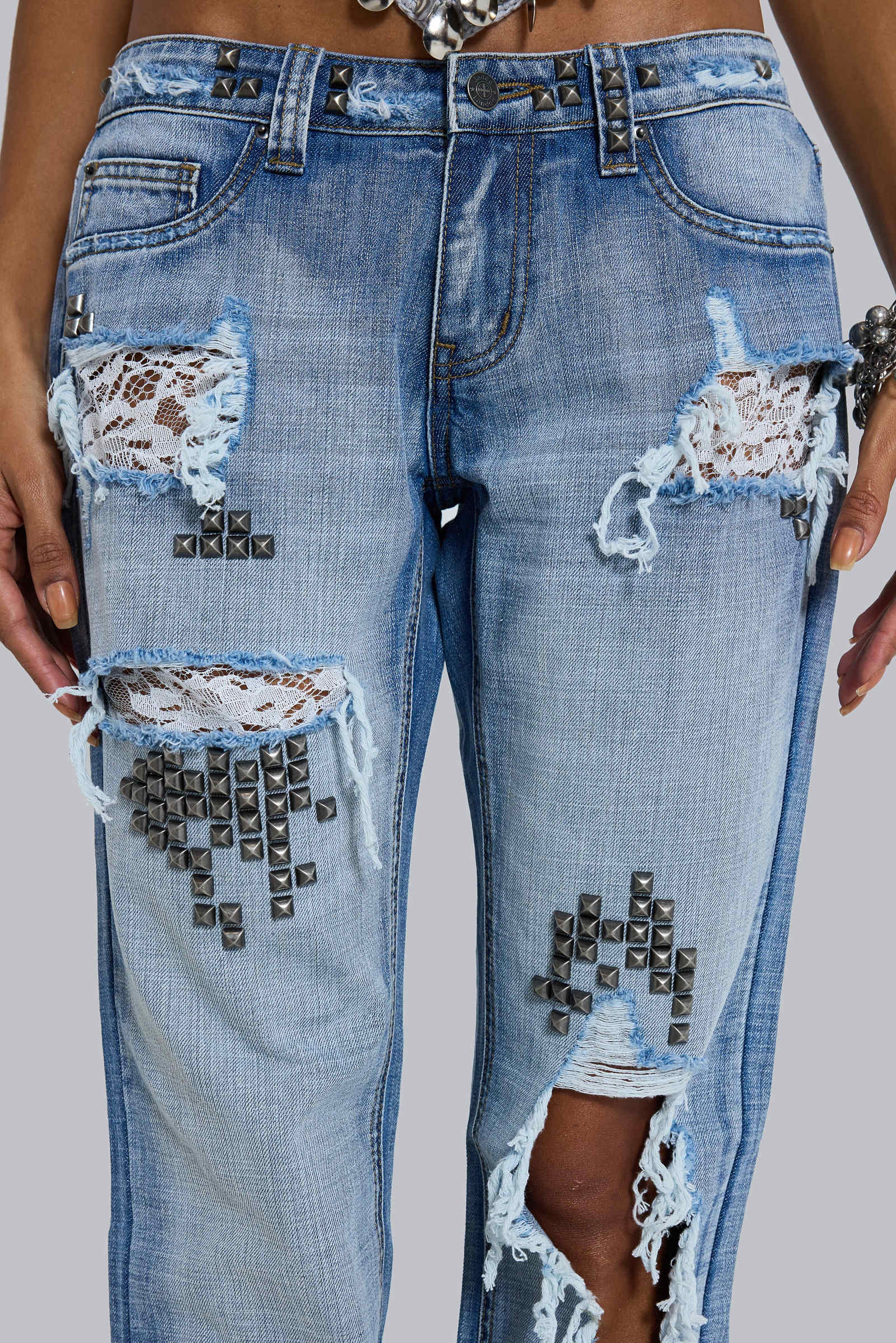 Tori Distressed Lace Low Rise Bootcut Jeans in Light Wash
