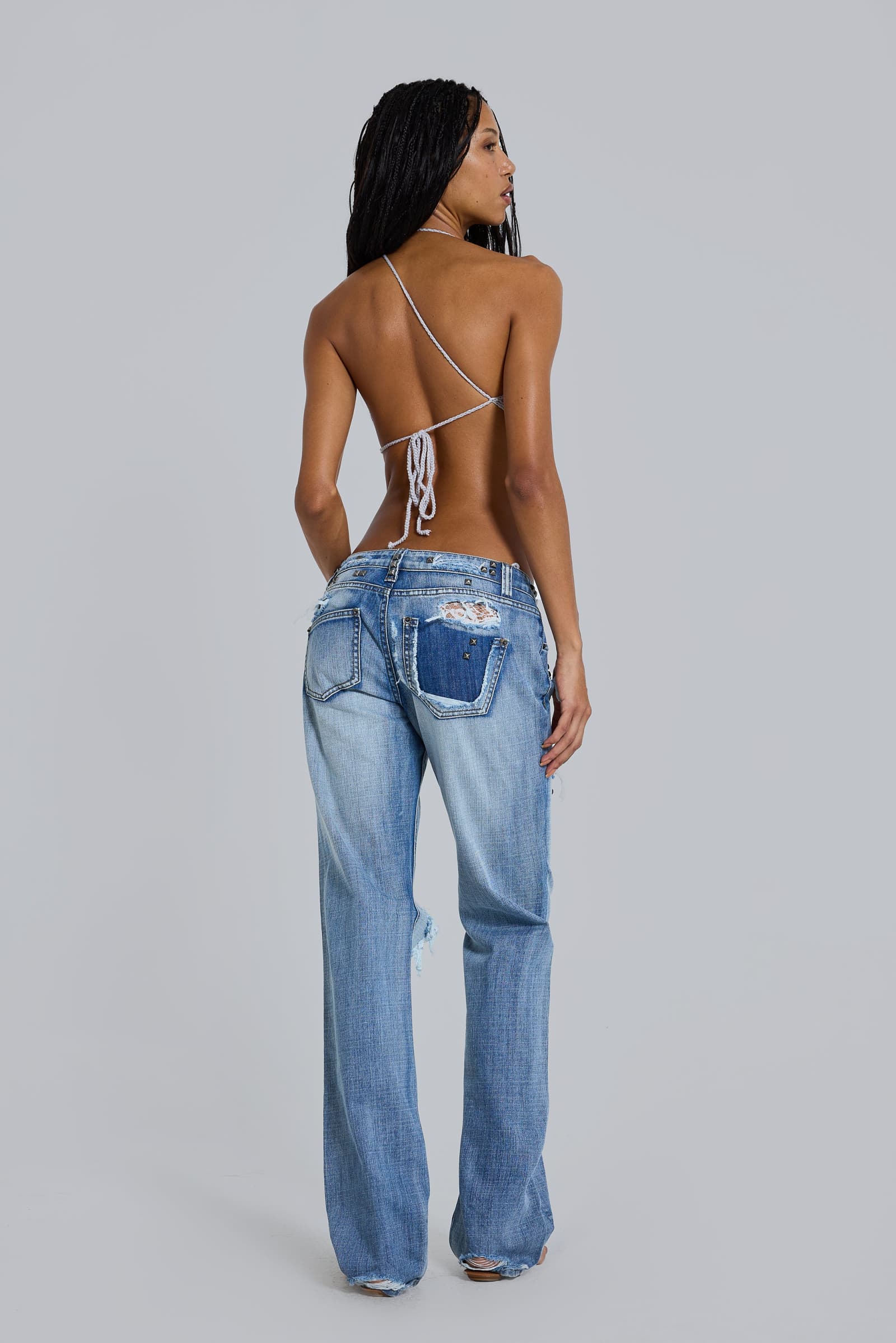 Tori Distressed Lace Low Rise Bootcut Jeans in Light Wash