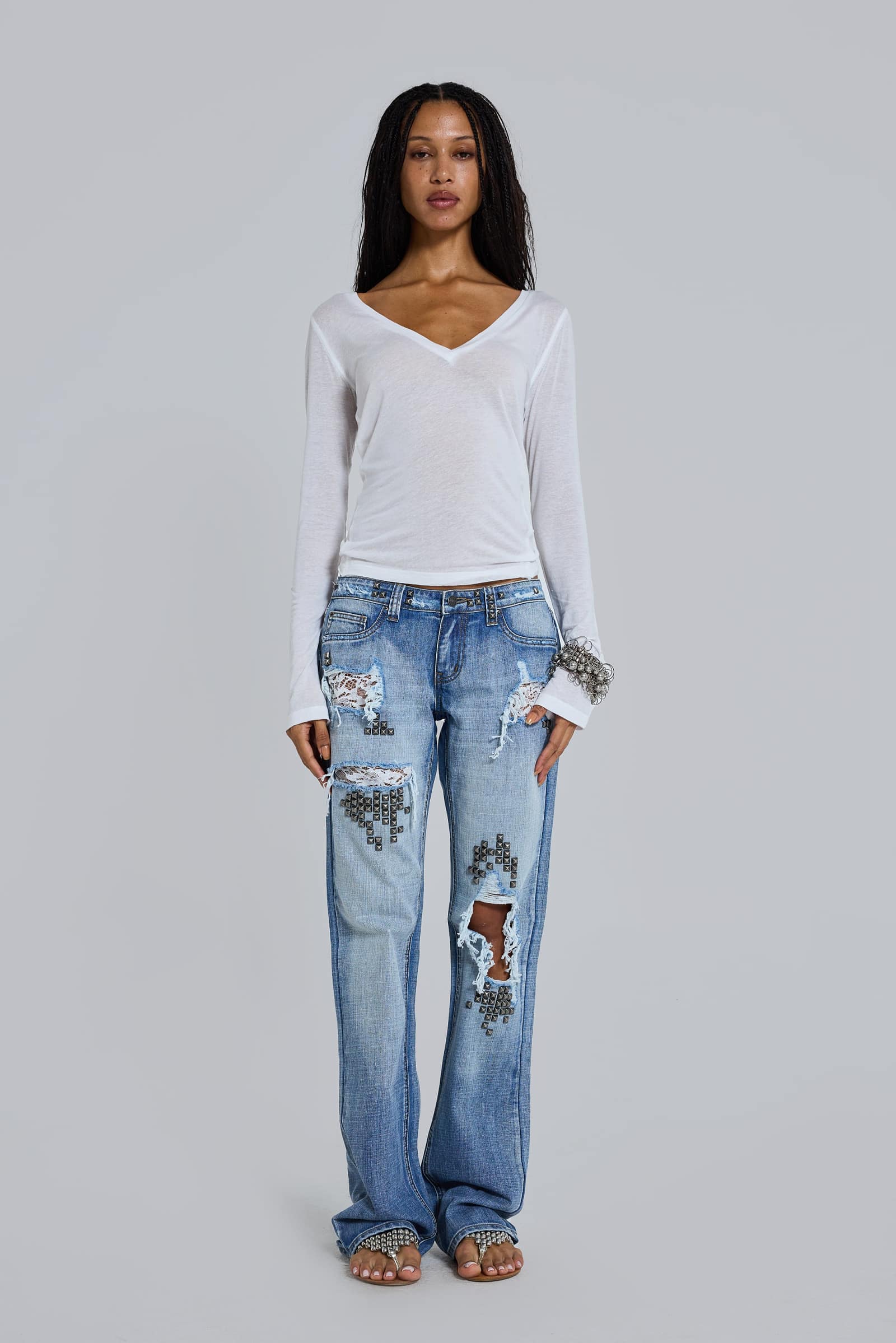 Tori Distressed Lace Low Rise Bootcut Jeans in Light Wash